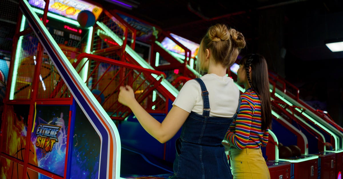 Effect of "Version" setting in Bandai Namco's Arcade Game Series: Galaga (Steam) - Friends Playing Basketball in an Amusement Center