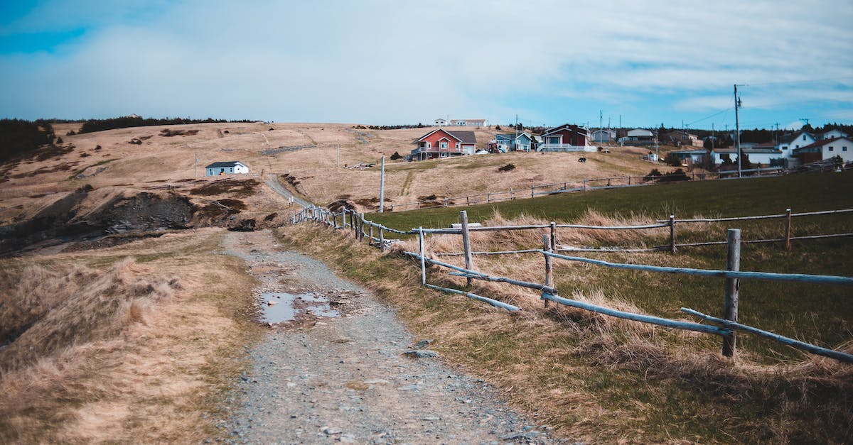 Effective Way to Keep Track of House v/s Families Situation - Narrow straight gravel path going amidst dry grassy fields along wooden fence in remote countryside Effective Way to Keep Track of House v/s Families Situation - Narrow straight gravel path going amidst dry grassy fields along wooden fence in remote countryside