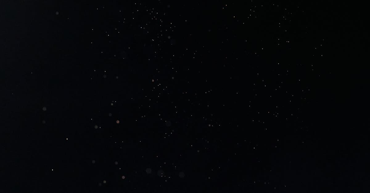 Effects of recursing - Tiny White Dust Particles on Black Background