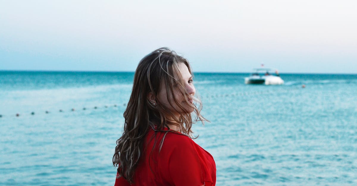 Eggs won't hatch while travelling on a boat - Woman Standing in Front of Body of Water Eggs won't hatch while travelling on a boat - Woman Standing in Front of Body of Water