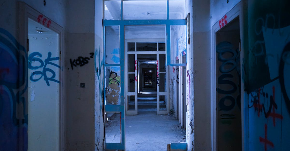 Enchant Property: Damage vs. Attack Speed % - Empty hall in abandoned shabby building with graffiti walls Enchant Property: Damage vs. Attack Speed % - Empty hall in abandoned shabby building with graffiti walls