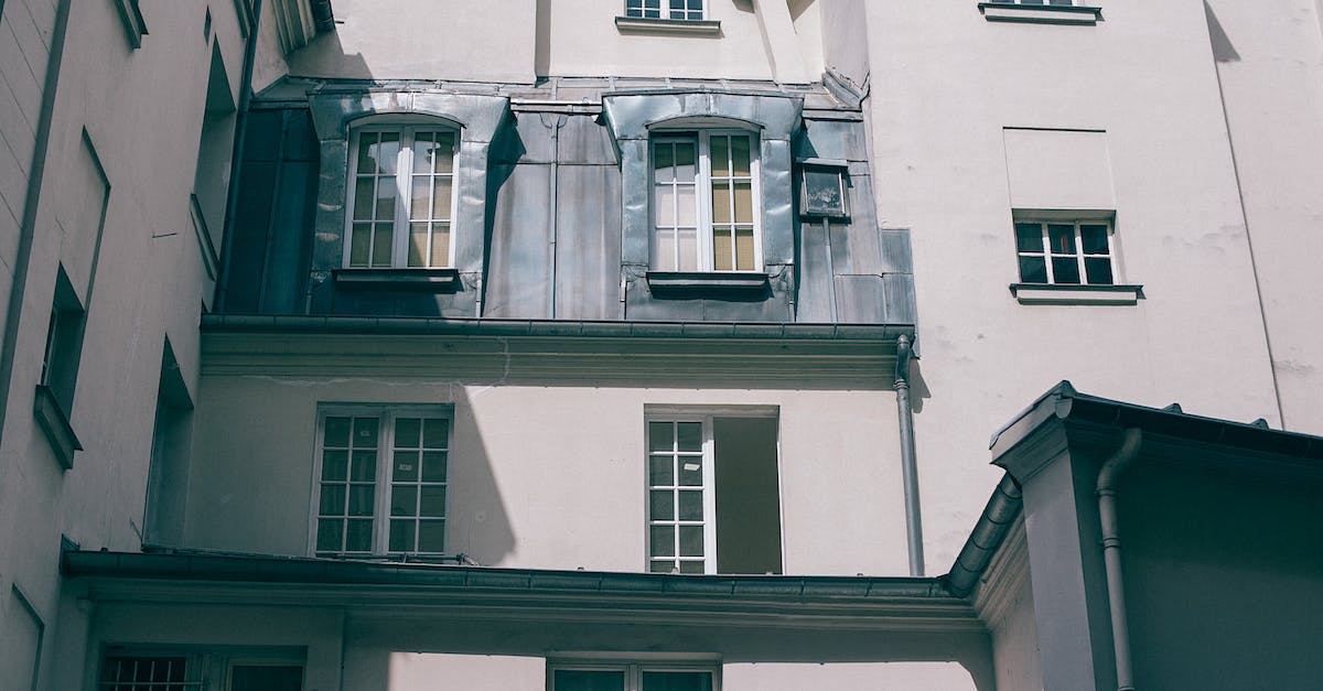 Enemy level too high in Playthrough 1 - Low angle of old fashioned gray residential house with square windows at daytime Enemy level too high in Playthrough 1 - Low angle of old fashioned gray residential house with square windows at daytime