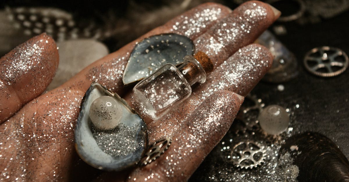 Equipping magic find gear immediately before elite death - Woman with seashells and shimmering pearl with glass jar Equipping magic find gear immediately before elite death - Woman with seashells and shimmering pearl with glass jar