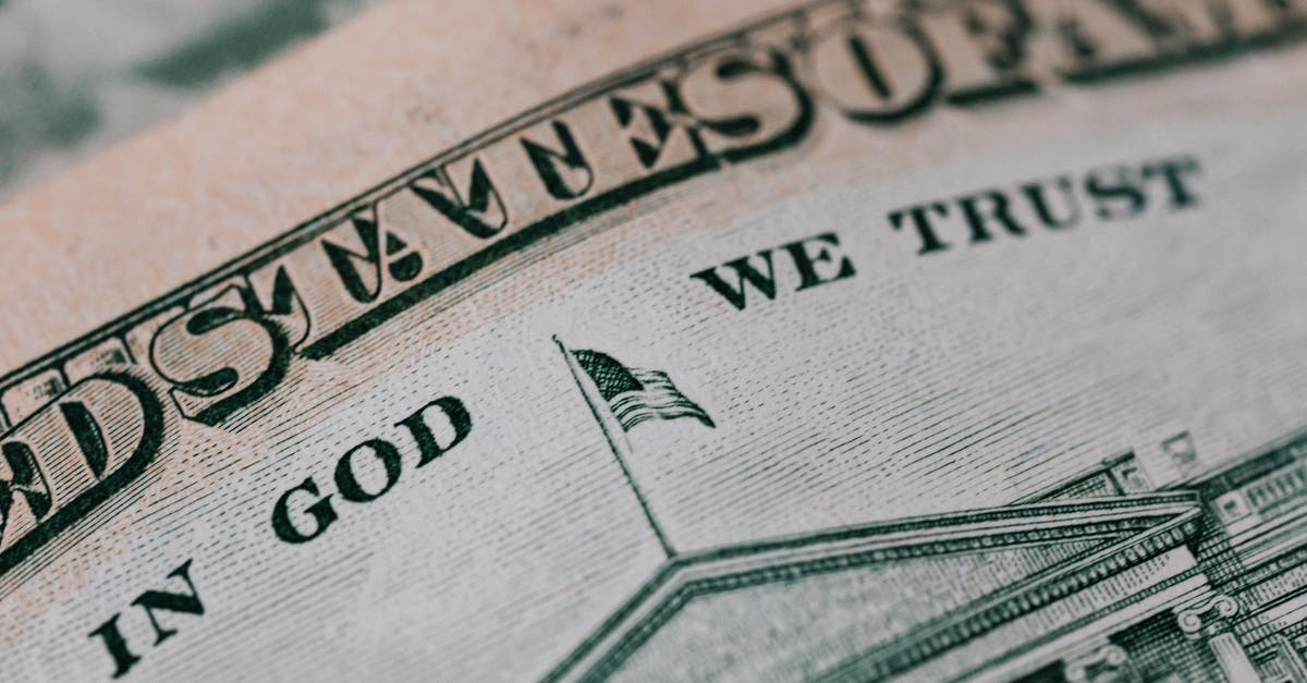Everdrive save states, how is it possible? - Closeup of ten dollar with inscription In God We Trust bill placed on table with different money Everdrive save states, how is it possible? - Closeup of ten dollar with inscription In God We Trust bill placed on table with different money