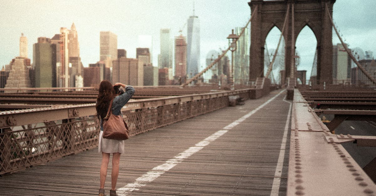 Exploring the City of the Undead - How can I recover my possessions here? - Photo Of Woman On Standing On Wooden bridge Exploring the City of the Undead - How can I recover my possessions here? - Photo Of Woman On Standing On Wooden bridge