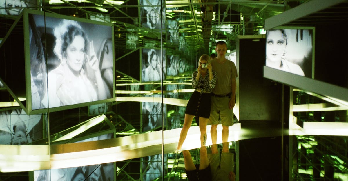 Export camera gallery in Watchdogs 2 - Man and Woman Standing Near Photo of Woman Inside Glass Room Export camera gallery in Watchdogs 2 - Man and Woman Standing Near Photo of Woman Inside Glass Room