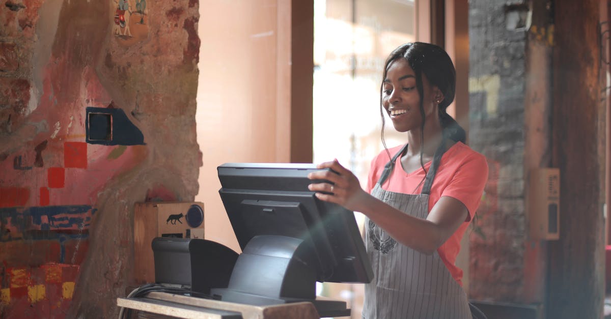 F4 Menu in DarkRP Server will not work - Cheerful American African waitress in apron working on counter monitor while registering order at cozy cafe F4 Menu in DarkRP Server will not work - Cheerful American African waitress in apron working on counter monitor while registering order at cozy cafe