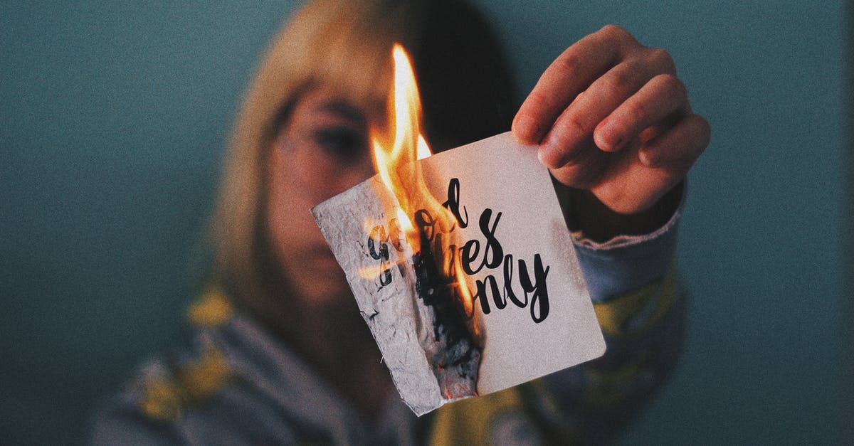 Fail to finish the color-changing potion? - Anonymous woman burning paper with inscription Fail to finish the color-changing potion? - Anonymous woman burning paper with inscription