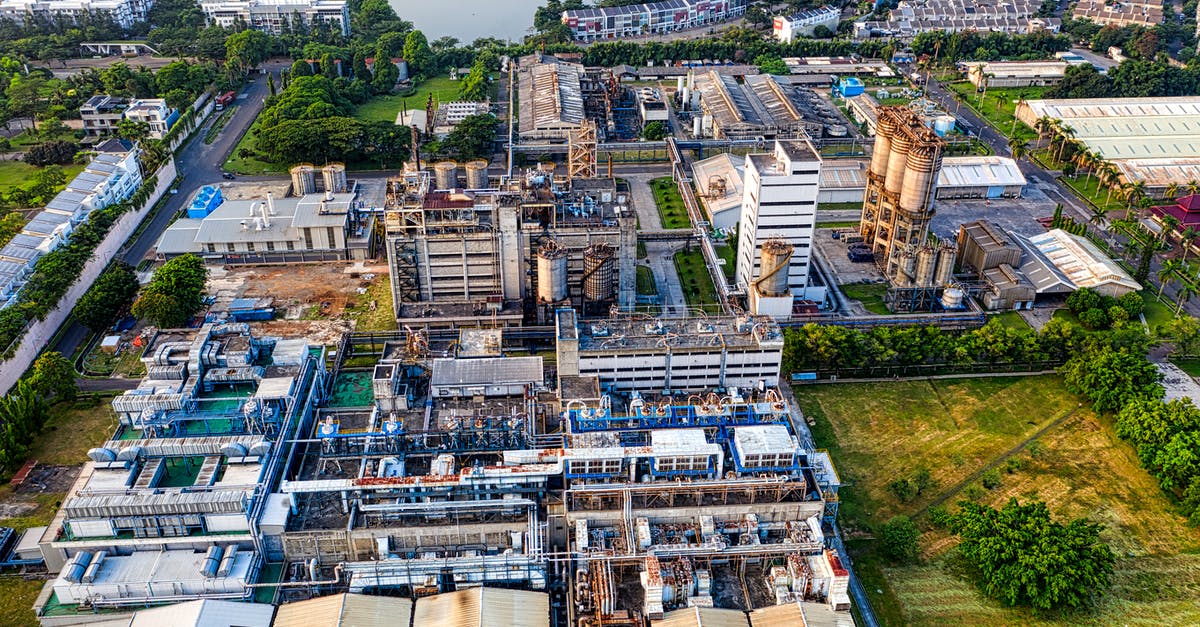 Fallout 4 settlement storage [duplicate] - Cityscape of industrial town with factory