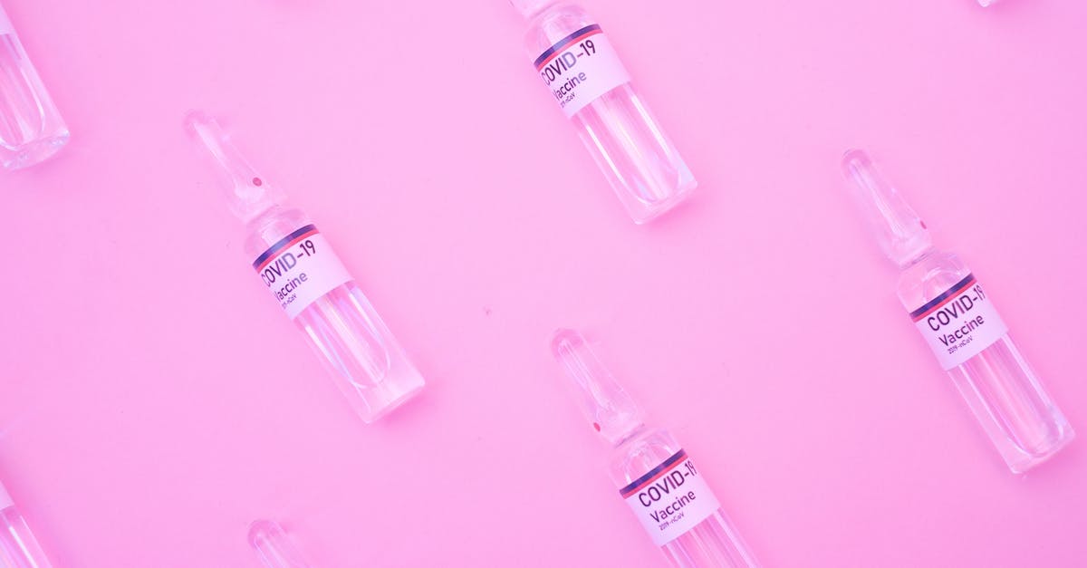 Fallout New Vegas, hardcore mode. A doctor refuses to heal non-crippled damaged limb of the Courier in full hp - Glass ampoules of COVID vaccine on pink surface Fallout New Vegas, hardcore mode. A doctor refuses to heal non-crippled damaged limb of the Courier in full hp - Glass ampoules of COVID vaccine on pink surface