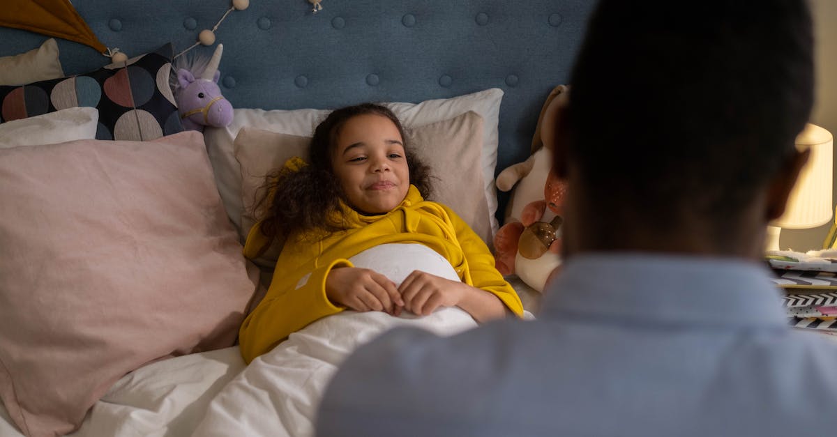 Family dweller? [duplicate] - Girl in Yellow Shirt Lying on Bed