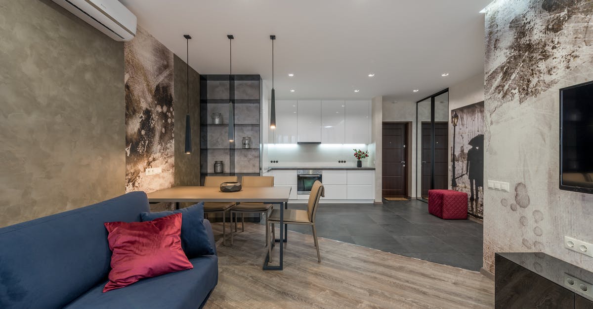 Faster to Falco AC Bair or SHFFL Bair? - Modern apartment with sofa and TV in living room and kitchen