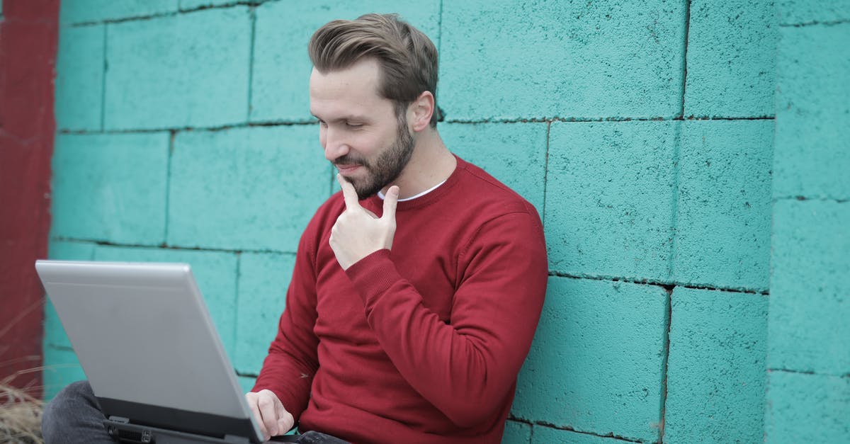 Fifa 16 stops working while checking connection - Man in Red Long Sleeve Shirt Using Gray Laptop Computer Fifa 16 stops working while checking connection - Man in Red Long Sleeve Shirt Using Gray Laptop Computer