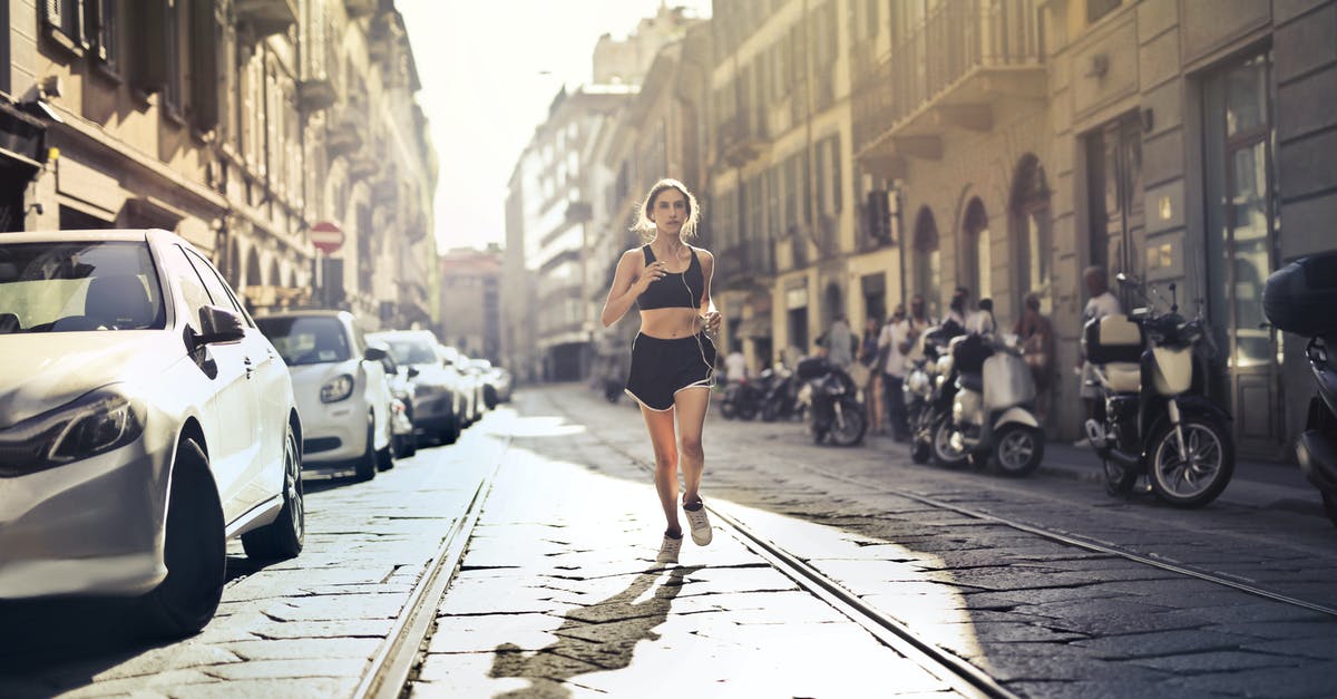 FIFA 18 gets stuck with the music still running - Photo of Woman Listening to Music on Earphones Jogging Down a Paved Street FIFA 18 gets stuck with the music still running - Photo of Woman Listening to Music on Earphones Jogging Down a Paved Street
