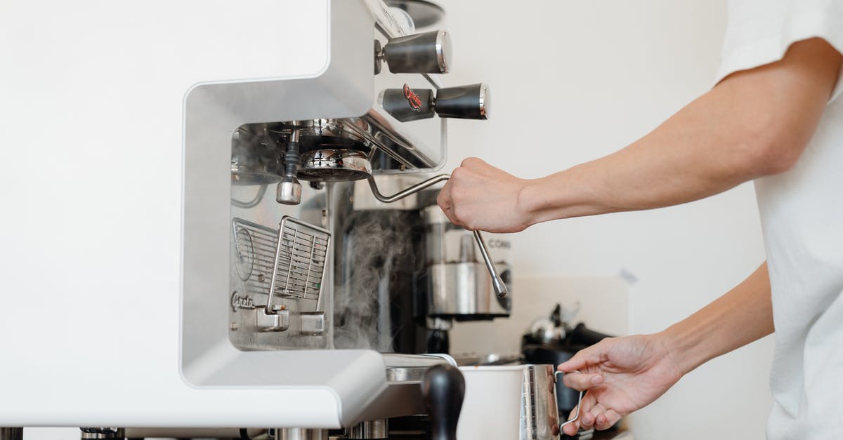Filter games to Mac-compatible on Steam - Side view crop anonymous barista in white shirt preparing to steam milk in frothing pitcher using professional coffee machine steam wand Filter games to Mac-compatible on Steam - Side view crop anonymous barista in white shirt preparing to steam milk in frothing pitcher using professional coffee machine steam wand