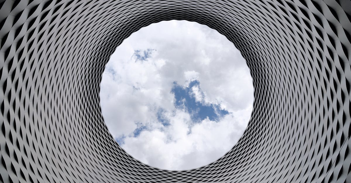Finding Aluminium is so hard! - Low-angle Photography of Grey and Black Tunnel Overlooking White Cloudy and Blue Sky Finding Aluminium is so hard! - Low-angle Photography of Grey and Black Tunnel Overlooking White Cloudy and Blue Sky