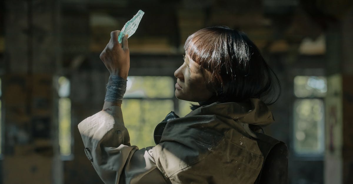 Finding better weapons? - Man in Brown Jacket Holding White Paper Finding better weapons? - Man in Brown Jacket Holding White Paper