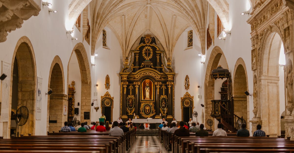 Finding my old mass effect save files - Back view of anonymous religious people sitting on wooden pews near corridor and altar in old stone church Finding my old mass effect save files - Back view of anonymous religious people sitting on wooden pews near corridor and altar in old stone church