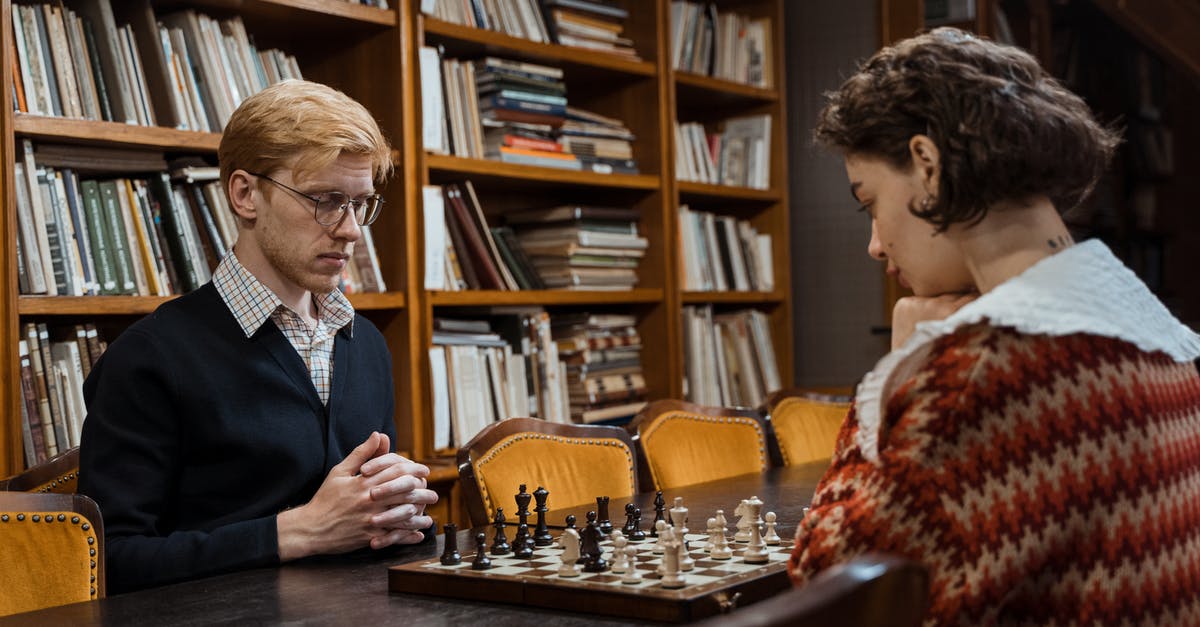 Finished Defend the Castle, failed Tactical Thinking? - A Man and Woman Playing Chess Finished Defend the Castle, failed Tactical Thinking? - A Man and Woman Playing Chess