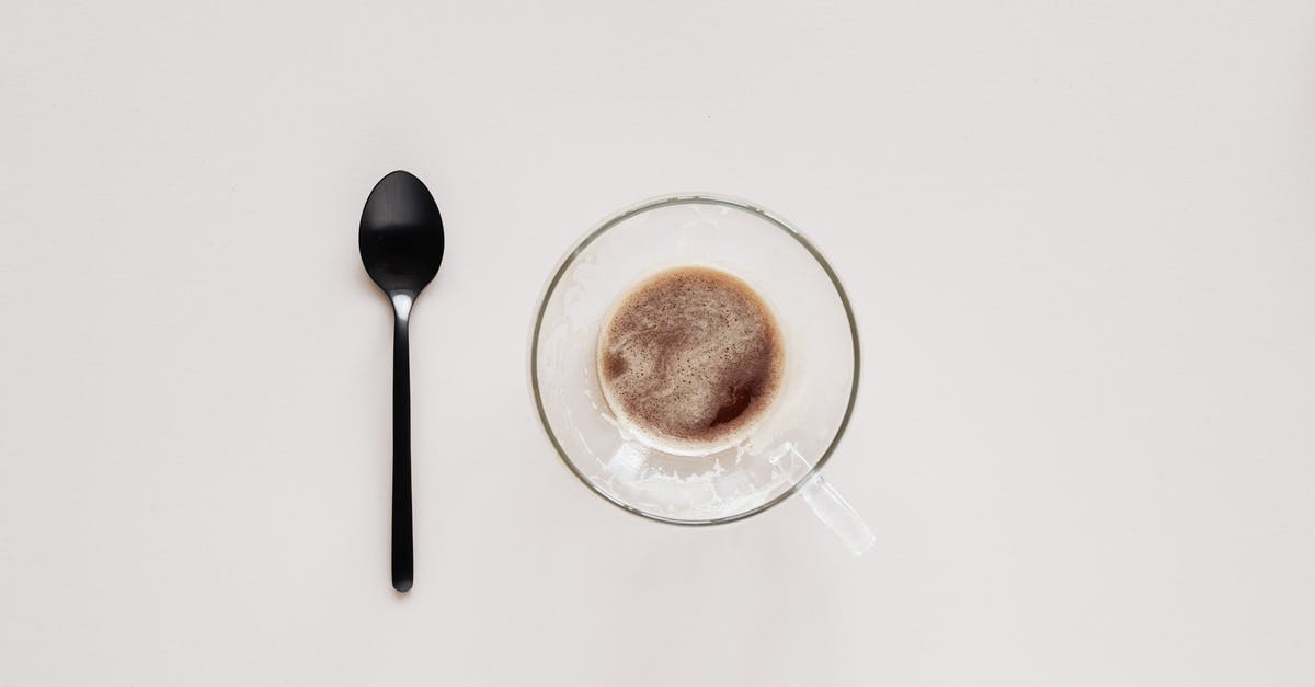 Firekeepers in Dark Souls - what is their place in the Dark Souls Universe? - Cup of coffee and teaspoon on beige background Firekeepers in Dark Souls - what is their place in the Dark Souls Universe? - Cup of coffee and teaspoon on beige background