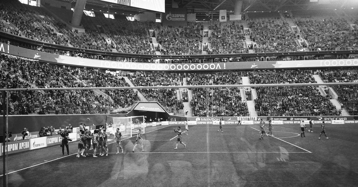 First challenger loses but team win means elimination? - Stadium players celebrating goal during football match