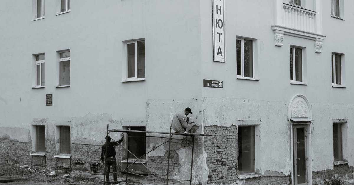 Fix LOD Texture Glitch in Oblivion - Workers renovating wall of residential house Fix LOD Texture Glitch in Oblivion - Workers renovating wall of residential house