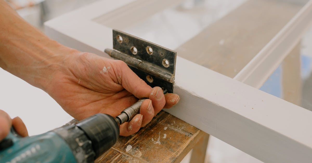 Fix or reinstall DirectX in Windows 8 - Crop unrecognizable worker drilling metal hinge on white window frame during house renovation Fix or reinstall DirectX in Windows 8 - Crop unrecognizable worker drilling metal hinge on white window frame during house renovation
