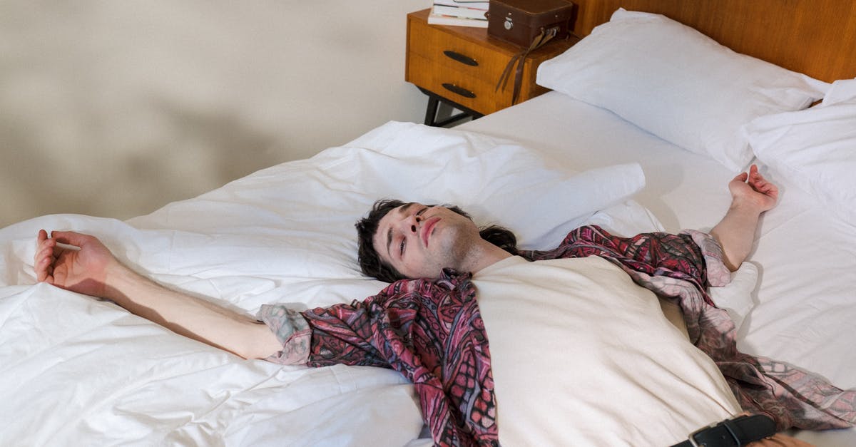 Force a Player out of bed on a certain night? - Young Man Laying on Back in Bed and Chilling Out Force a Player out of bed on a certain night? - Young Man Laying on Back in Bed and Chilling Out