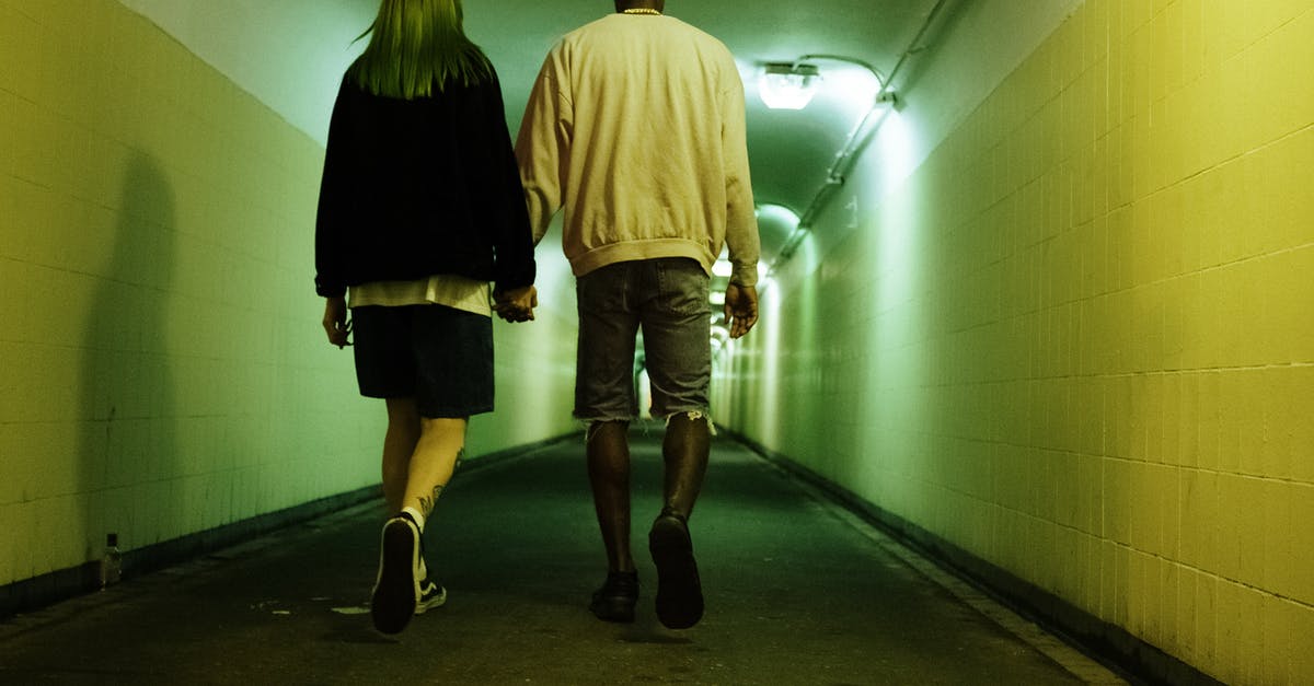 Forcing a faction to revolt - Man and Woman Walking on Hallway Forcing a faction to revolt - Man and Woman Walking on Hallway