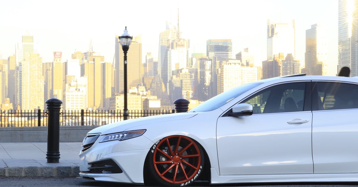 Forcing Fullscreen at a custom resolution - White Car Parking on the Road at Daytime Forcing Fullscreen at a custom resolution - White Car Parking on the Road at Daytime