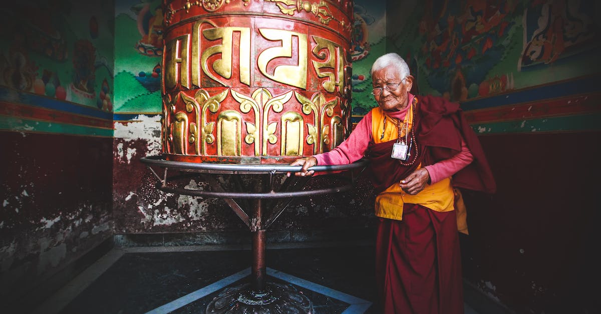 Foreigner son-in-law went on a killing spree, then formed a militia just to stand around for awhile... did I miss something? - Mature monk walking around prayer wheel in temple