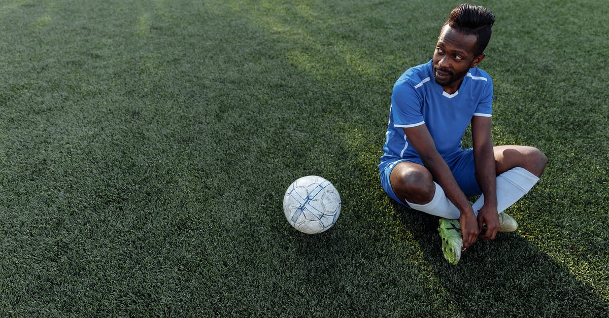 Forgot Player ID for Pokemon.com - Boy in Blue Crew Neck T-shirt and Black Shorts Playing Soccer on Green Grass Field