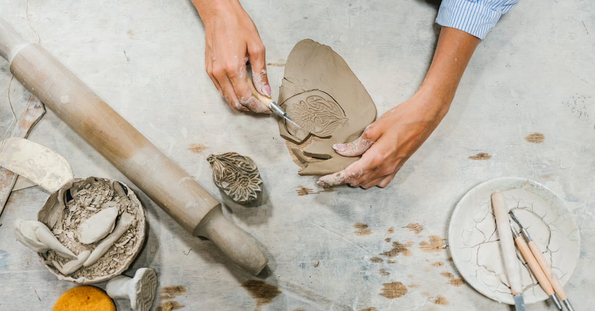 Forming clans in clash of clans - Person in Blue and White Stripe Shirt Holding Brown Wooden Rolling Pin