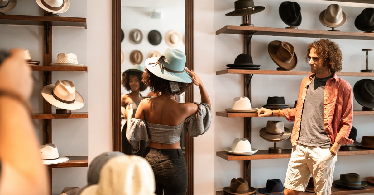 Fort suddently died, looking for an explanation - Woman in Black and White Dress Wearing White Hat