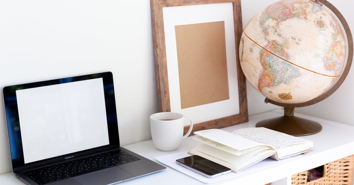 Frame rate drops from 60 FPS to 1-10 FPS - Laptop with empty screen placed near smartphone and organizer with blank frame and retro glove aside during coffee break in room Frame rate drops from 60 FPS to 1-10 FPS - Laptop with empty screen placed near smartphone and organizer with blank frame and retro glove aside during coffee break in room