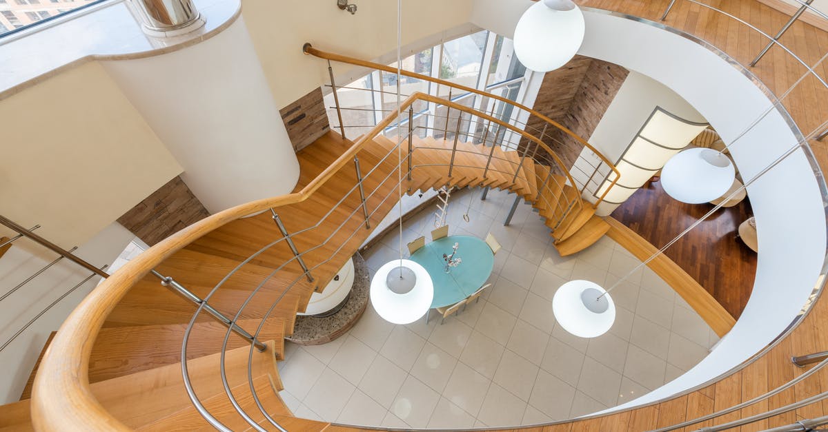 Frequent 5 second freezes in CS:GO - Large stairway leading to first floor of modern spacious apartment with glass walls