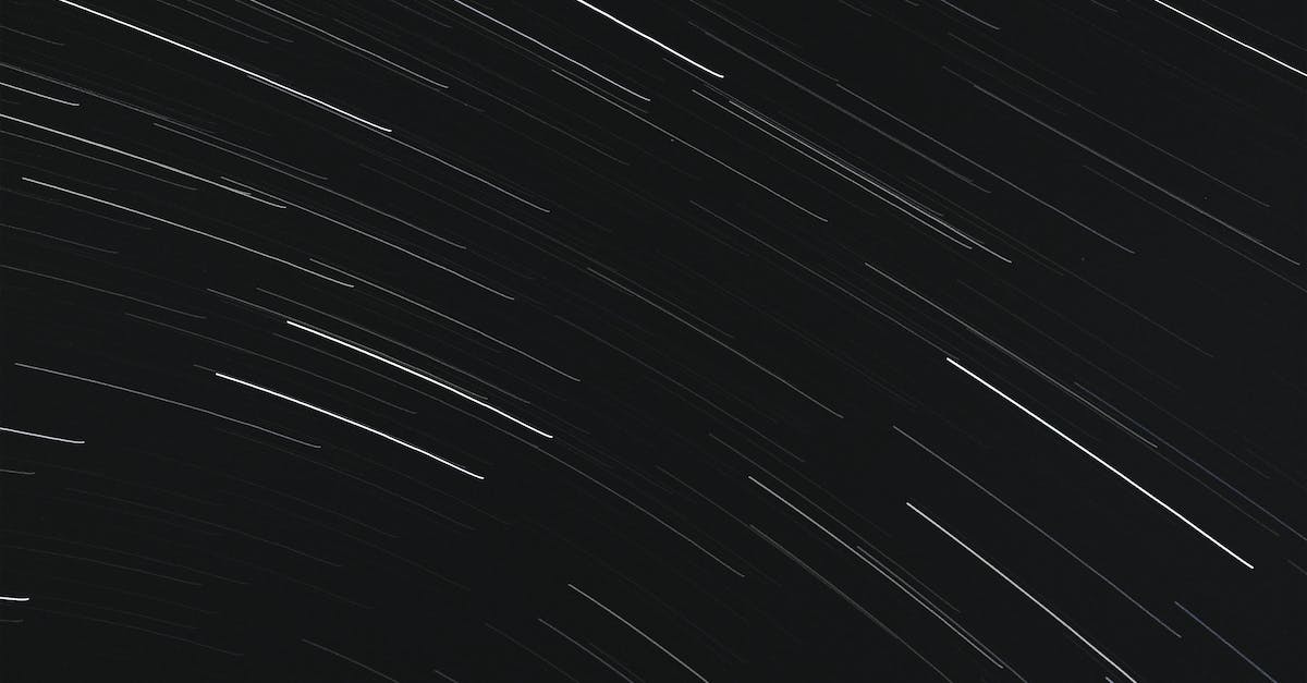 Frogs fell from the sky. Now what? - From below of bright glowing stars in long exposure on dark night sky