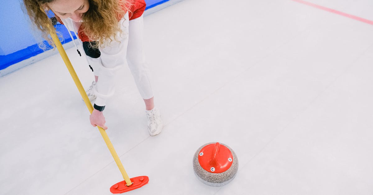 Frozen, Immobilized, anything else that stops you from moving? - Woman playing curling on ice sheet