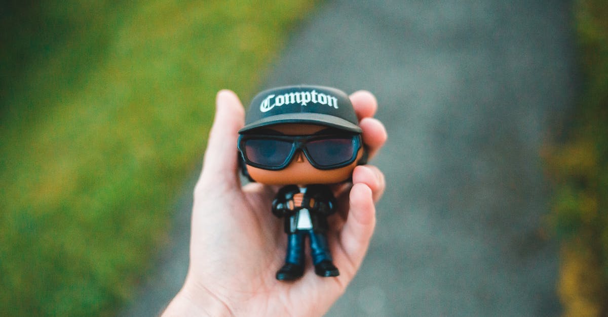 Game freezes trying to collect people from wasteland - Person carrying in hand small toy shaped as cool man