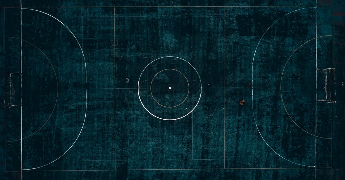 game not detecting any nearby gyms or pokestops in my area [duplicate] - Drone top view of outdoors football field with dark blue surface located in suburb in daylight