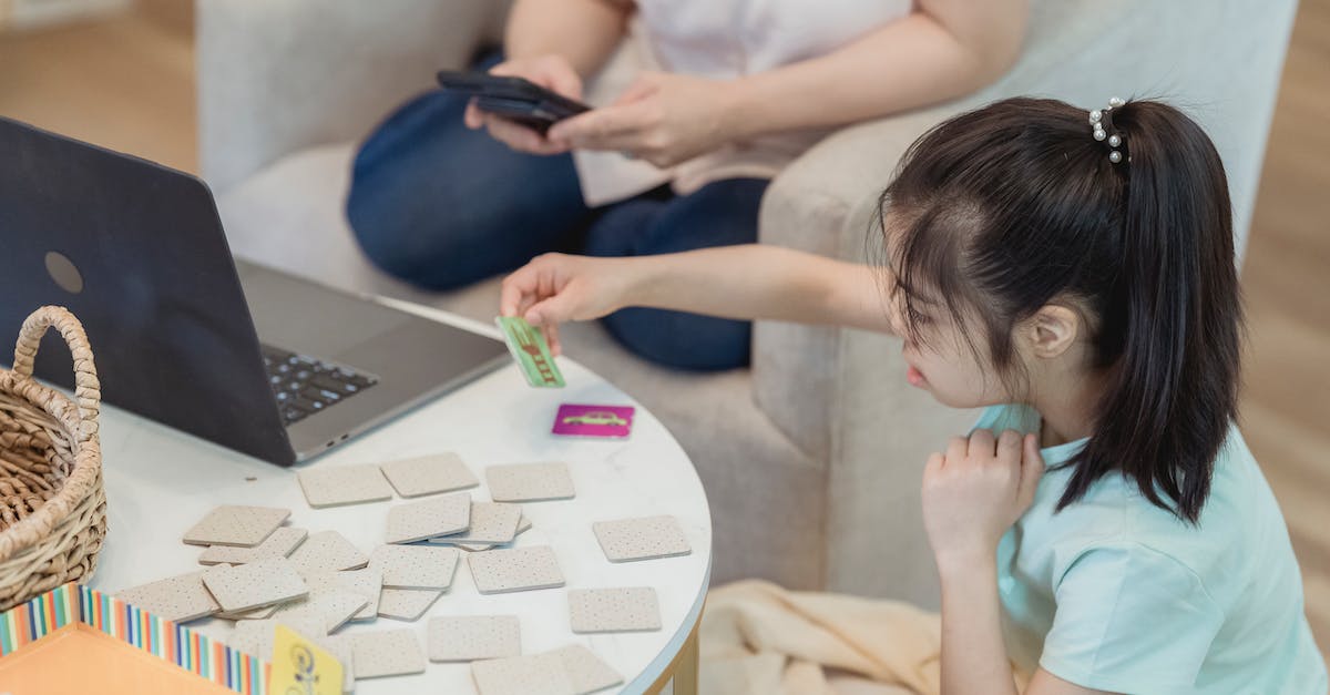 Gamecube Memory Cards Life Span - Girl in a Green Shirt Playing with Cards Gamecube Memory Cards Life Span - Girl in a Green Shirt Playing with Cards