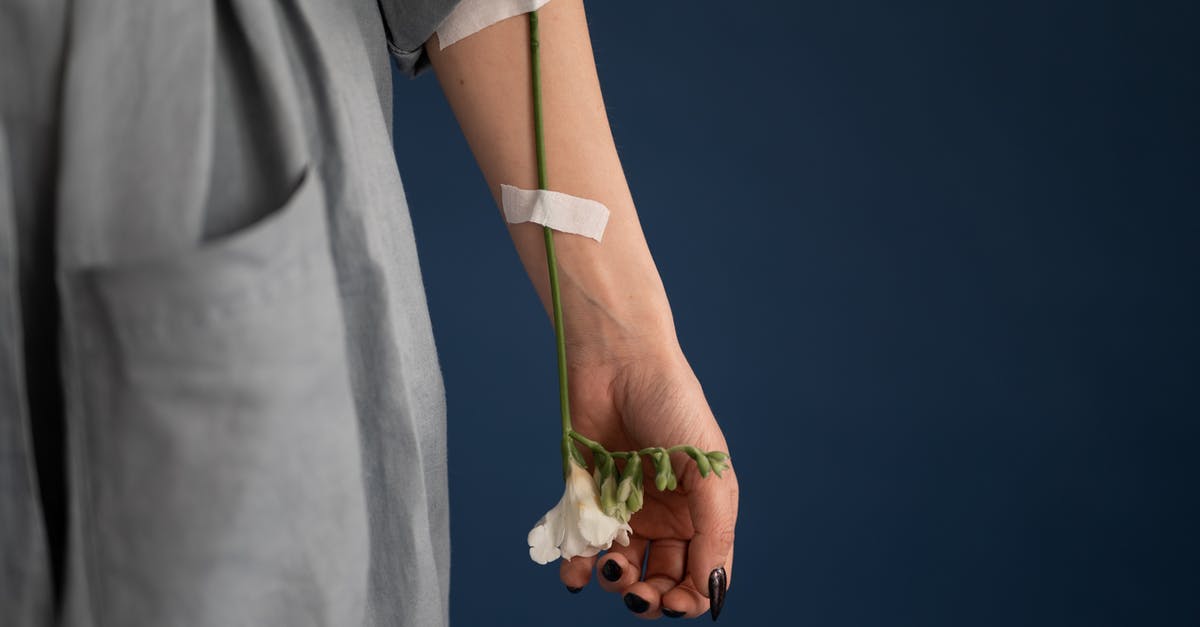 Gamepad left analog stick is not sensitive - Crop unrecognizable woman with flower attached to arm with plaster Gamepad left analog stick is not sensitive - Crop unrecognizable woman with flower attached to arm with plaster
