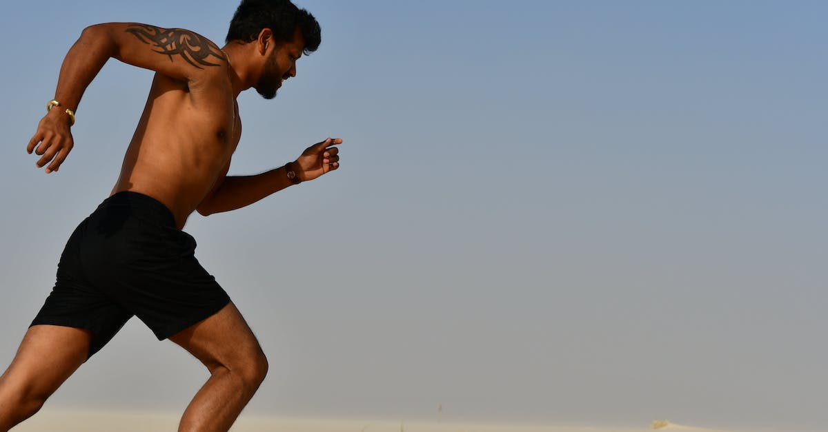 Games from gamejolt.com aren't permitted to run - Strong shirtless sportsman jogging on bright day Games from gamejolt.com aren't permitted to run - Strong shirtless sportsman jogging on bright day