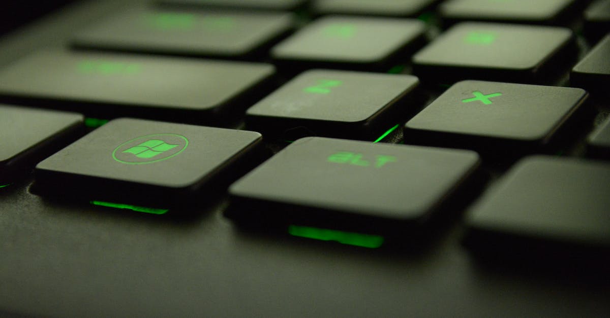 Gaming with an ergonomic keyboard? - Close-up Photography of Black and Green Computer Keyboard Keys