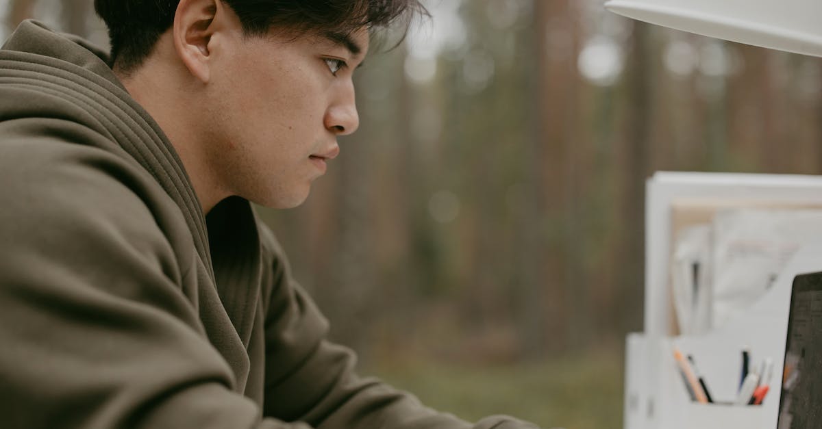 GBA SP screen suddenly turning darker for no reason - Man in Gray Jacket Looking Down