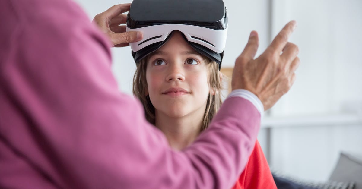 General term for the technology that allows games to be replayed? - A Girl Wearing a Virtual Reality Goggles