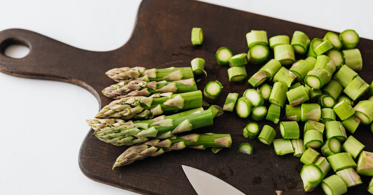 Get half-life CD key from Steam - Bunch of asparagus and knife on cutting board