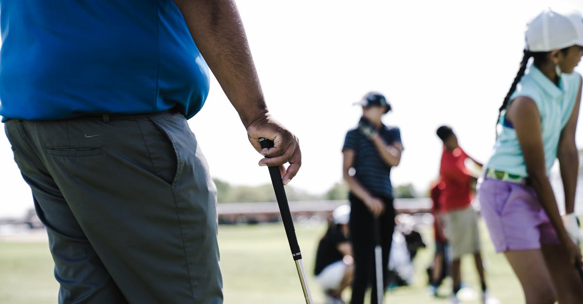 Get List of players in own club - Person Holding Golf Club Near Girl and Woman Get List of players in own club - Person Holding Golf Club Near Girl and Woman