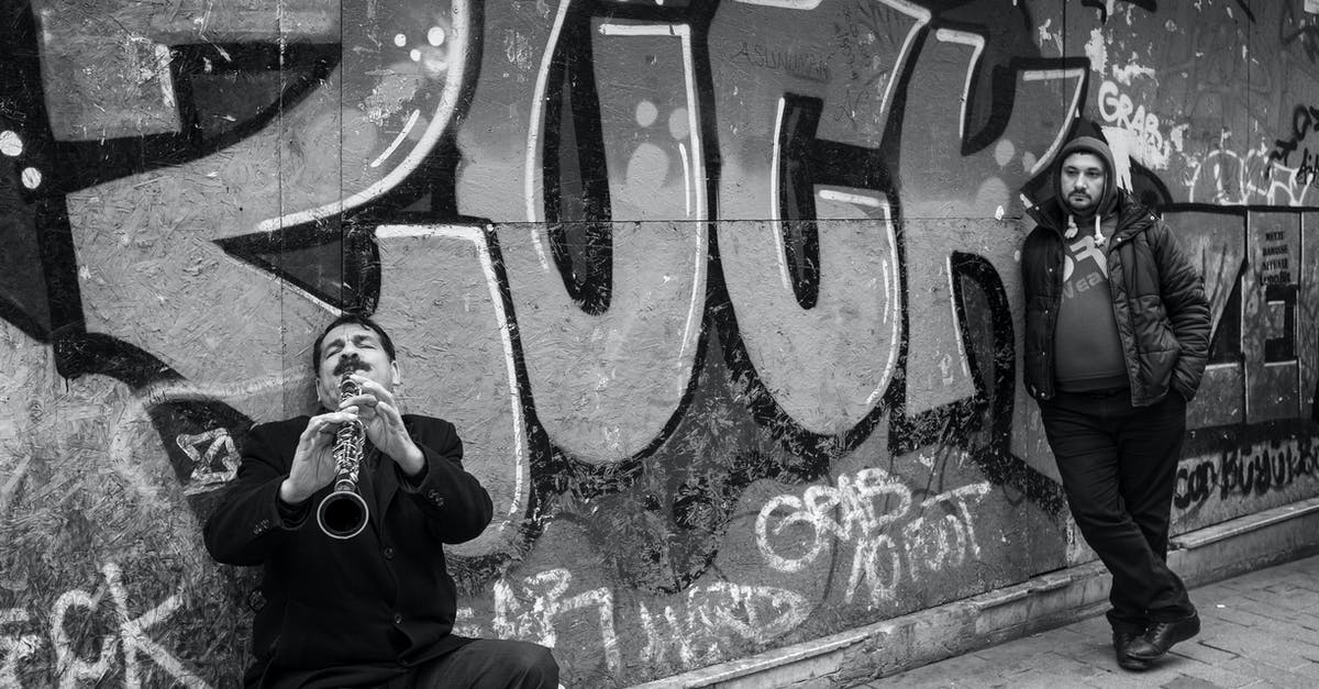 Getting real tired of the other players being cheeky - Man playing on trumpet on street Getting real tired of the other players being cheeky - Man playing on trumpet on street