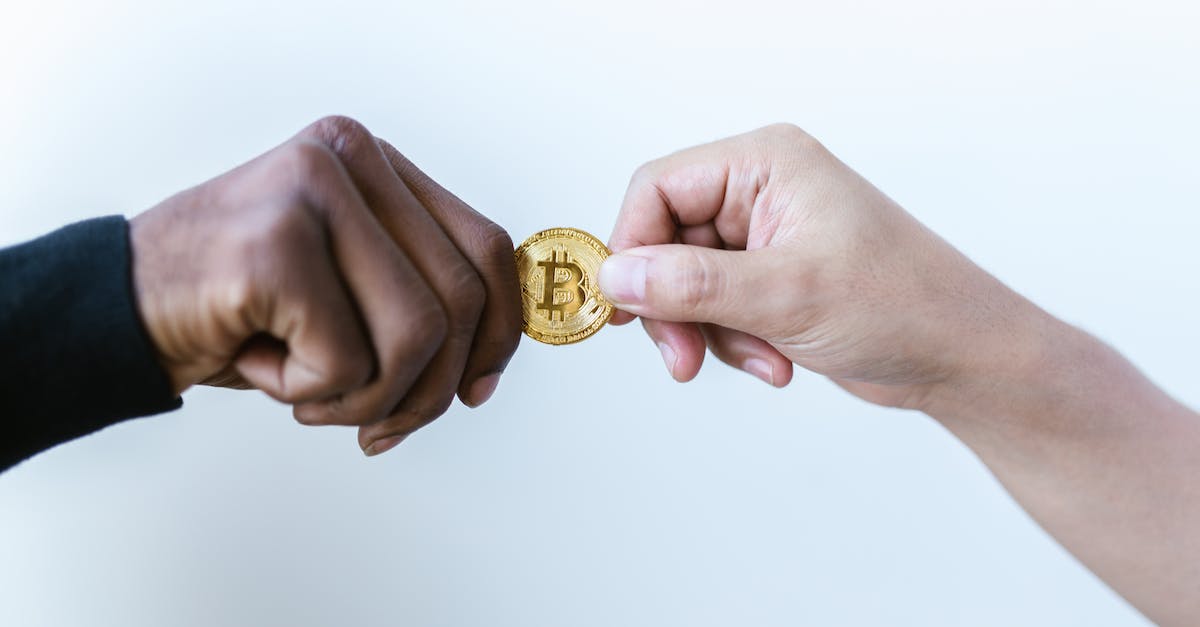 giving a score to an item with a Damaga value - Person Holding Gold Round Coin giving a score to an item with a Damaga value - Person Holding Gold Round Coin